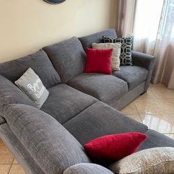 Gray Sectional Couch From Jerome's. Feathers Filled 