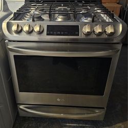 LG STAINLESS STEEL SLIDE IN GAS STOVE.....$ 350