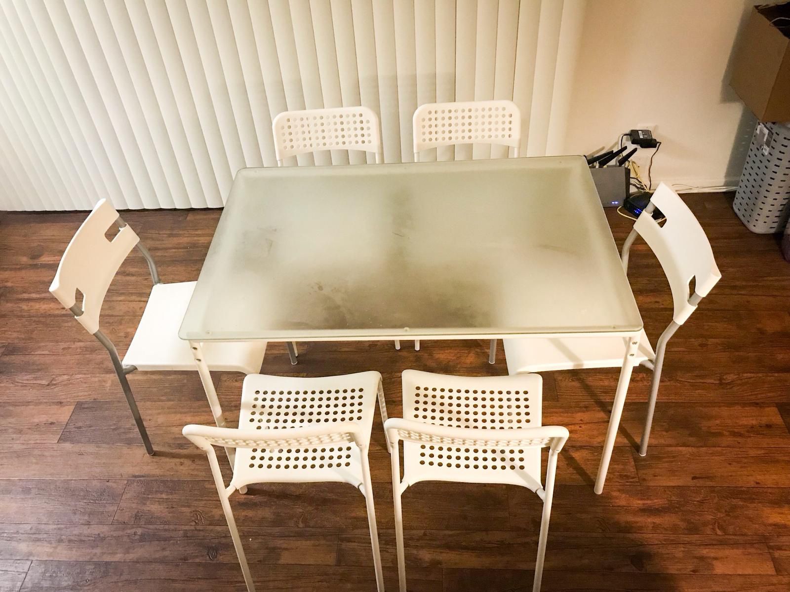 IKEA dining table glass top 6 chairs white