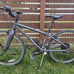 REI Rev City 24 inch kids hybrid bike