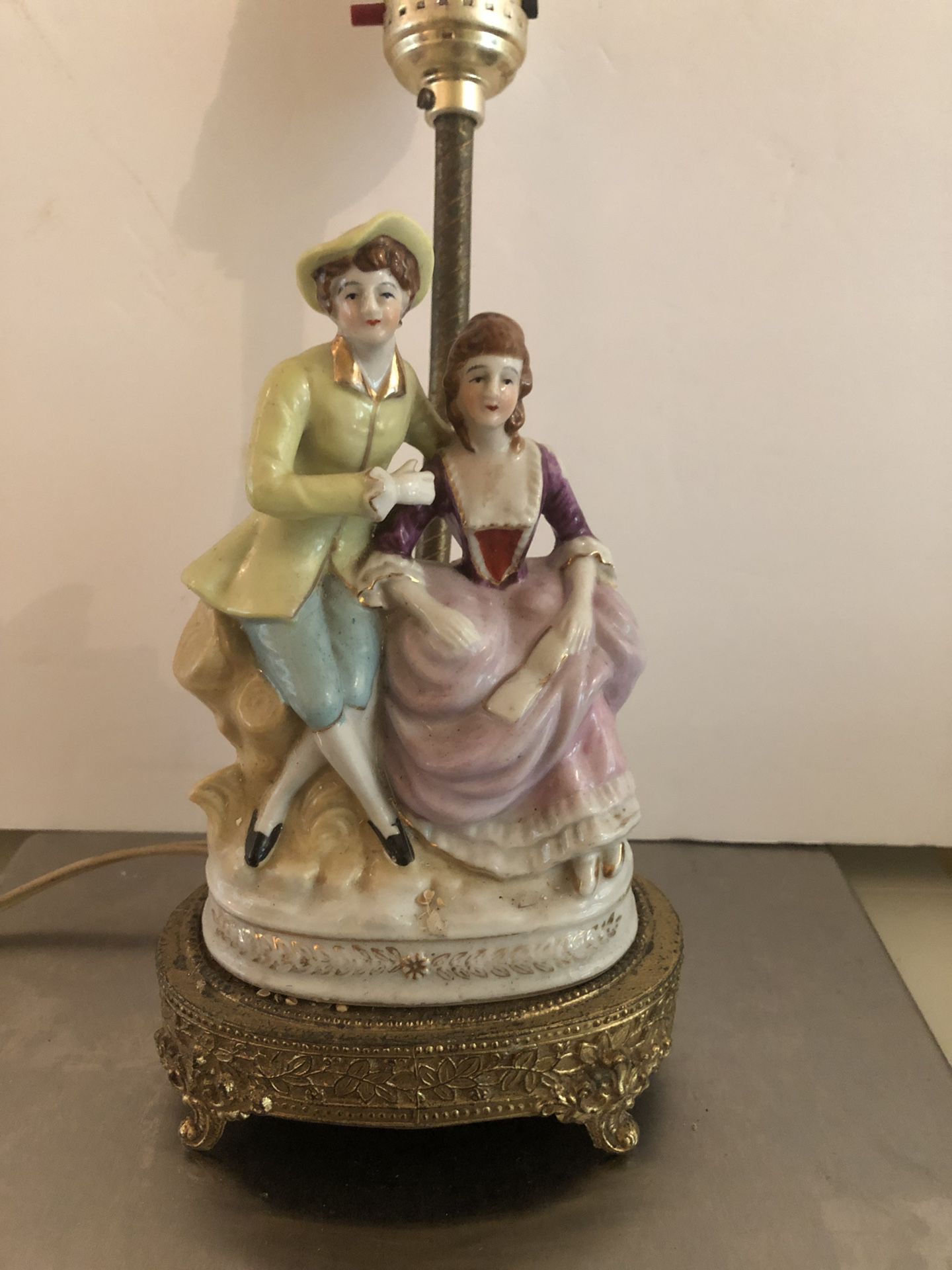 Figural antique porcelain lamp