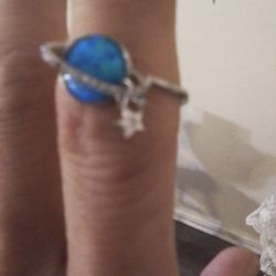 Saturn ring with dangling  star