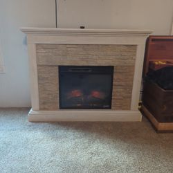 Home Decorators Collection Whittington 50 in. Freestanding Electric Fireplace in Tan with Tan Faux Stone