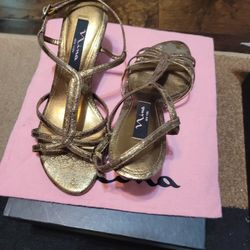 Gold Dress Shoe. .size 6 1/2 M..... NINA