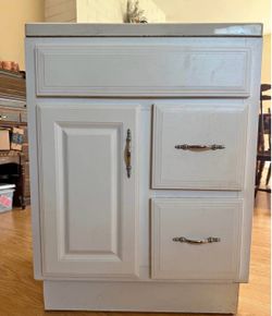 White vanity with 2 drawers and 1 door
