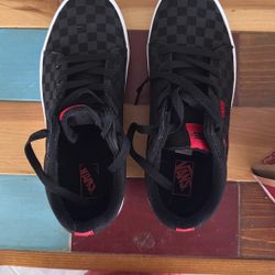 New Youth 6/ Women’s 8 Black Checkered Vans