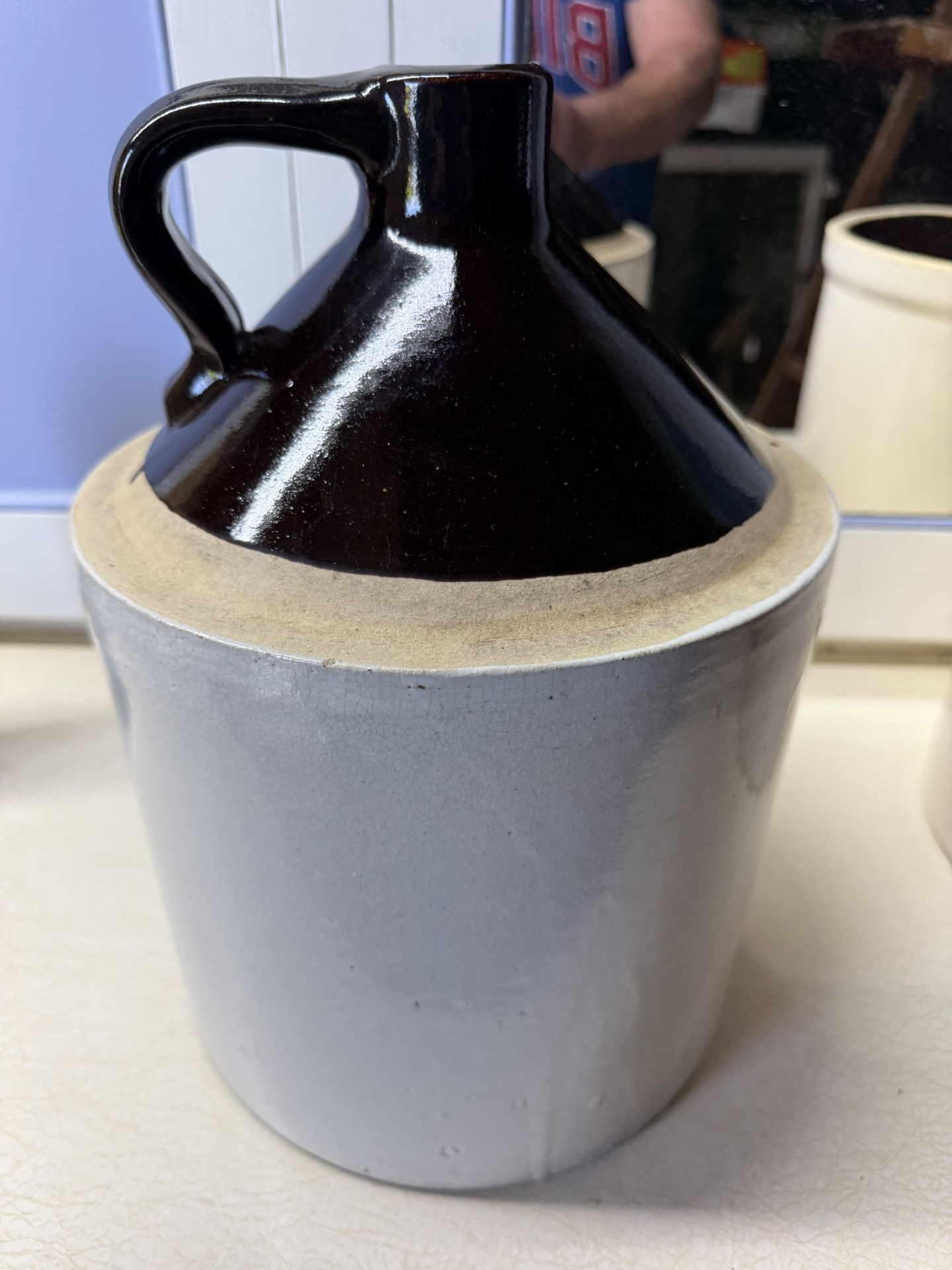 Vintage stoneware moonshine jug