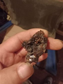 Purple crystal of some sort? It's 2in by 1 1/2in. Indian Rock effigiy