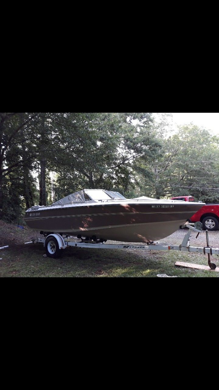 Boat and trailer $700