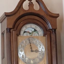 LIKE NEW BEAUTIFUL GRANDFATHERS WESTMINISTER CLOCK   (84" High)width 19"  WITH MOON DIALS & CHIMES. $350."