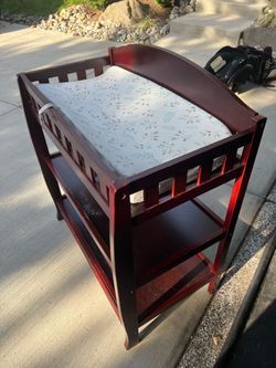 Diaper changing table with like new changing pad