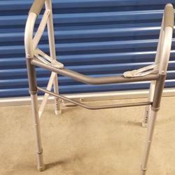 Folding walker. Like new condition .