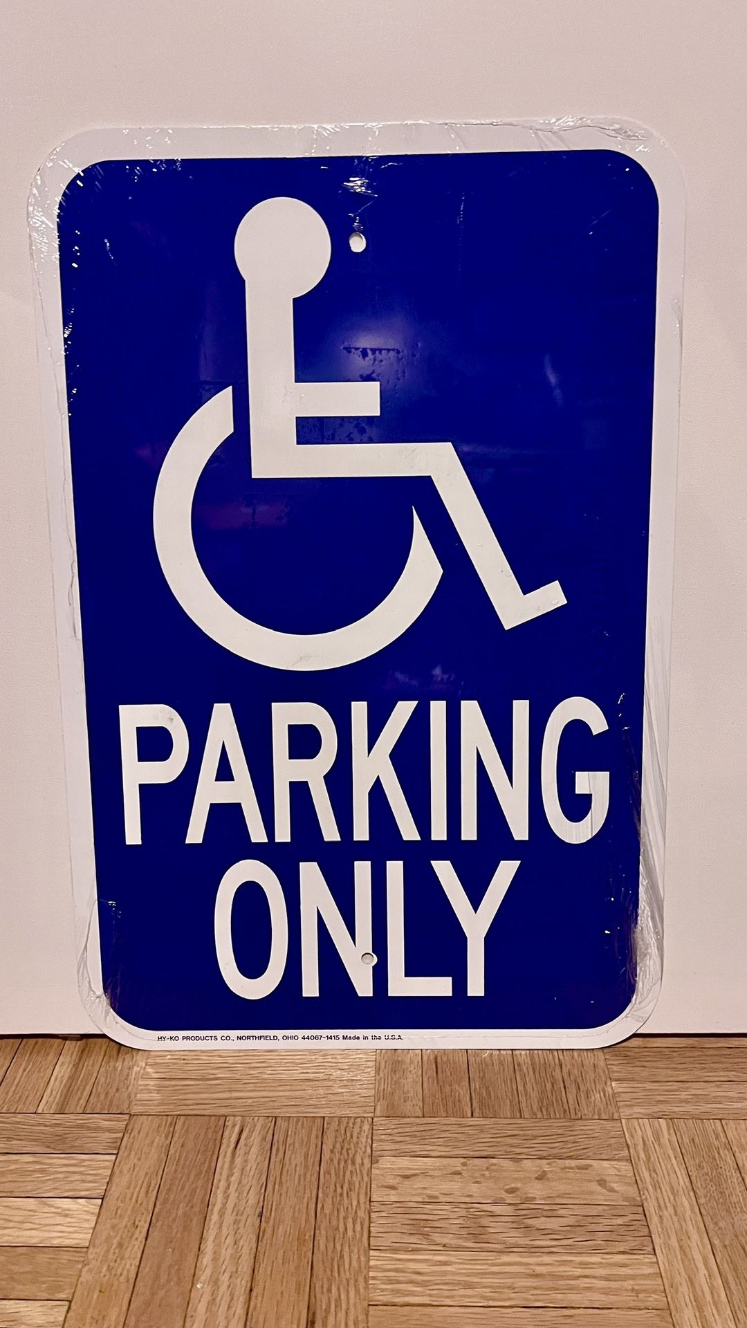 Handicapped parking sign.