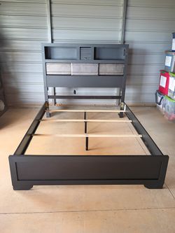 Queen size bedframe with a nightstand