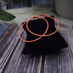 Orange retro 80's hippie hoop earrings approximately 2 1/4"