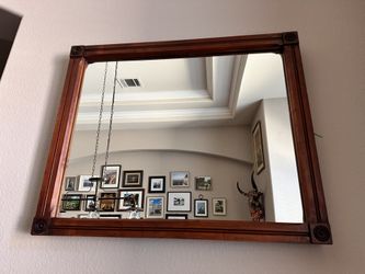 Vintage solid wood mirror with beautiful carved rounded corners