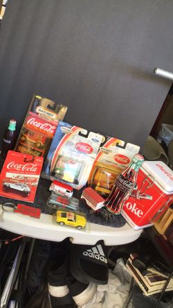 Collectible Coca Cola cars and other items