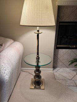 Antique brass lamp with attached table