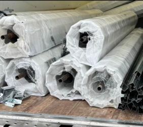 Rollup doors 8 by 7 - New. ( No tracks)