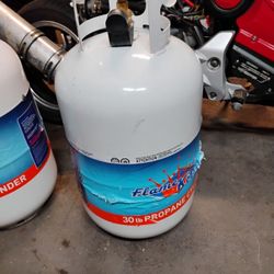 2    7 Gallon Propane Tanks 
