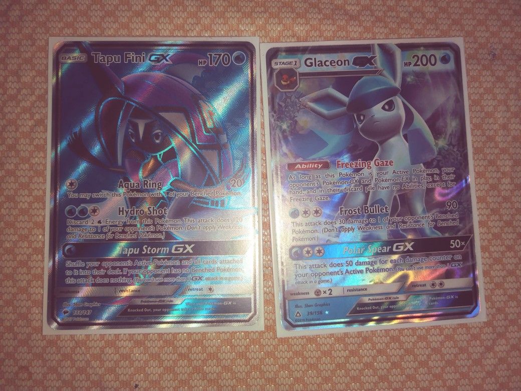 Glaceon GX pokemon card and a Full Art Tapu Fini pokemon card