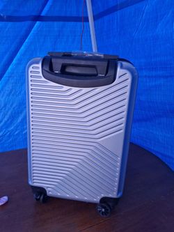 Silver traveling luggage