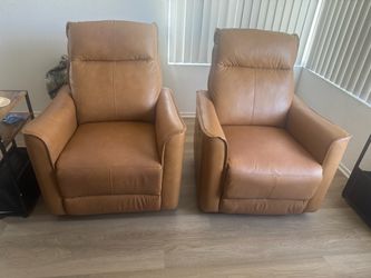 Two swivel and Rocker Recliner chairs