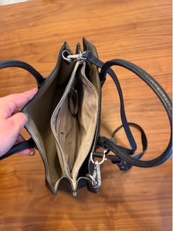 Black Michael Kors handbag with dust bag