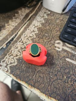 Gold-Tone Ring with Green Oval Stone