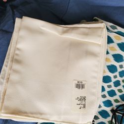 Four New Ivory Napkins