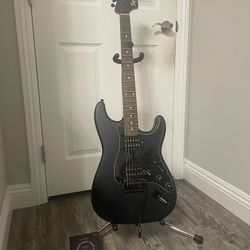 20th Anniversary Squier Stratocaster + Stand + NYXL Strings
