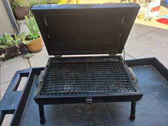 Small tabletop charcoal grill