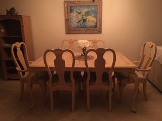 Solid wood dining room table with leaf & 6 chairs