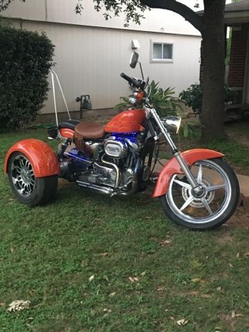 2012 custom 1200cc Harley Davidson trike.