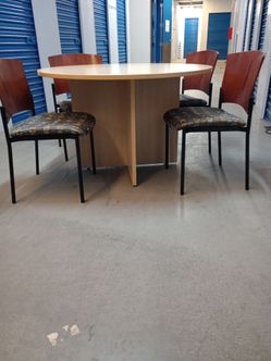 Round table and 4 chairs $ 220