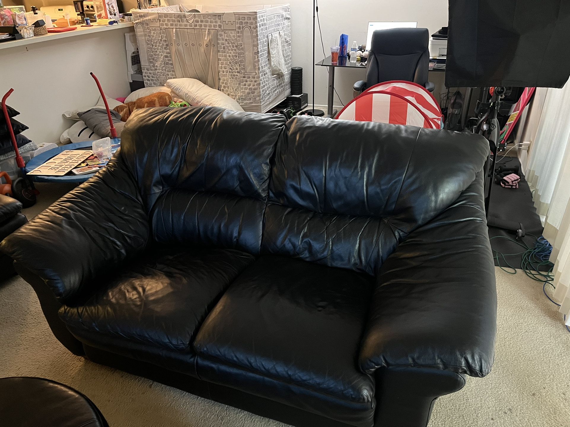 Matching leather Sofa and Captains Chair with footrest