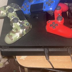 PS4 and PS3 duo with controllers