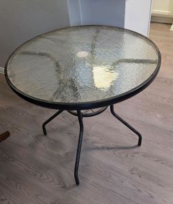Glass top round table