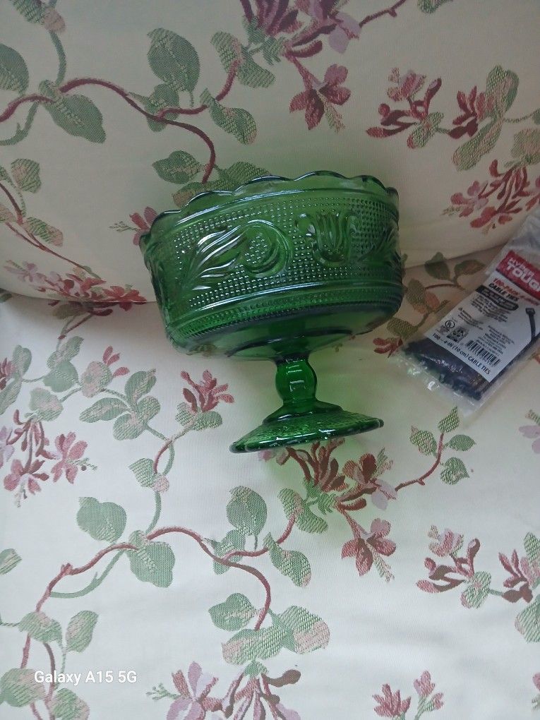 vintage E.O. Brody Co. green glass pedestal compote bowl, likely produced around the mid-20th century. Additional details include:
It is made of pre