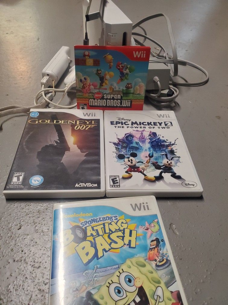 Nintendo Wii With One Control And 4 Games 80 Dollars Firm