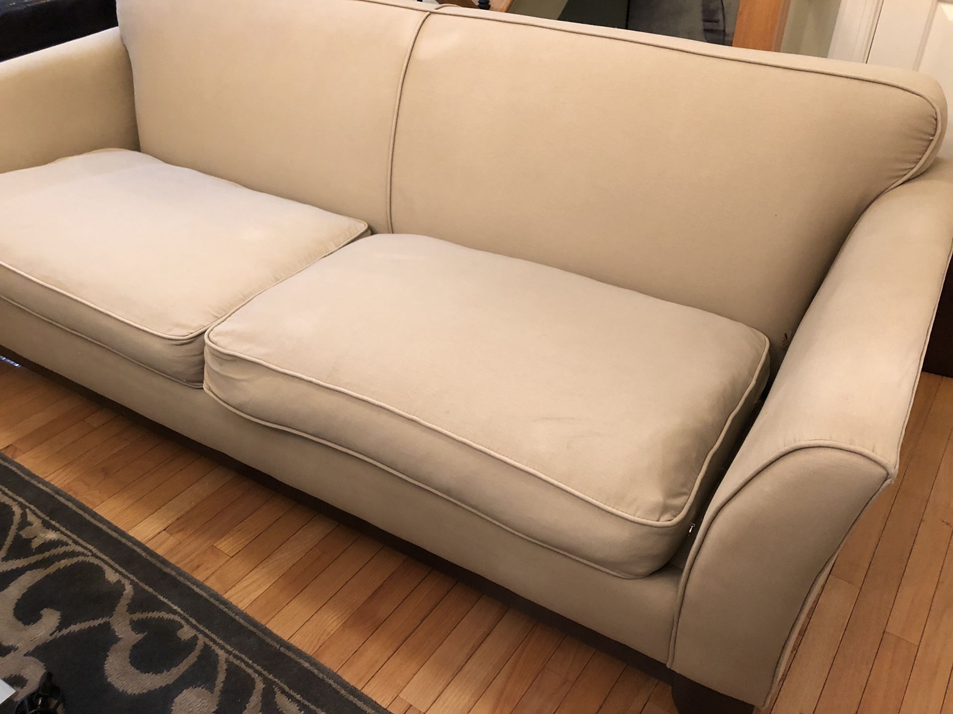 Pottery Barn sofa with down cushions.