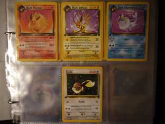 First Edition Team Rocket DARK EEVEELUTIONS