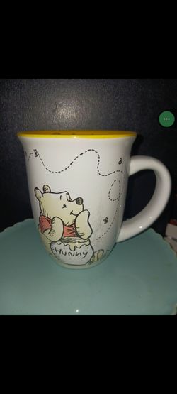 Mug: Disney Winnie the Pooh and Piglet. White exterior and yellow interior.