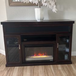 TV STAND Fireplace (actual adjustable heating) with 5 DIFFERENT FIRE COLORS , crystals inside fireplace, and BUILT IN SPEAKER 
