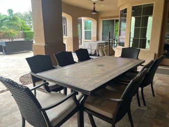 Outside table w/ 8 chairs - rattan