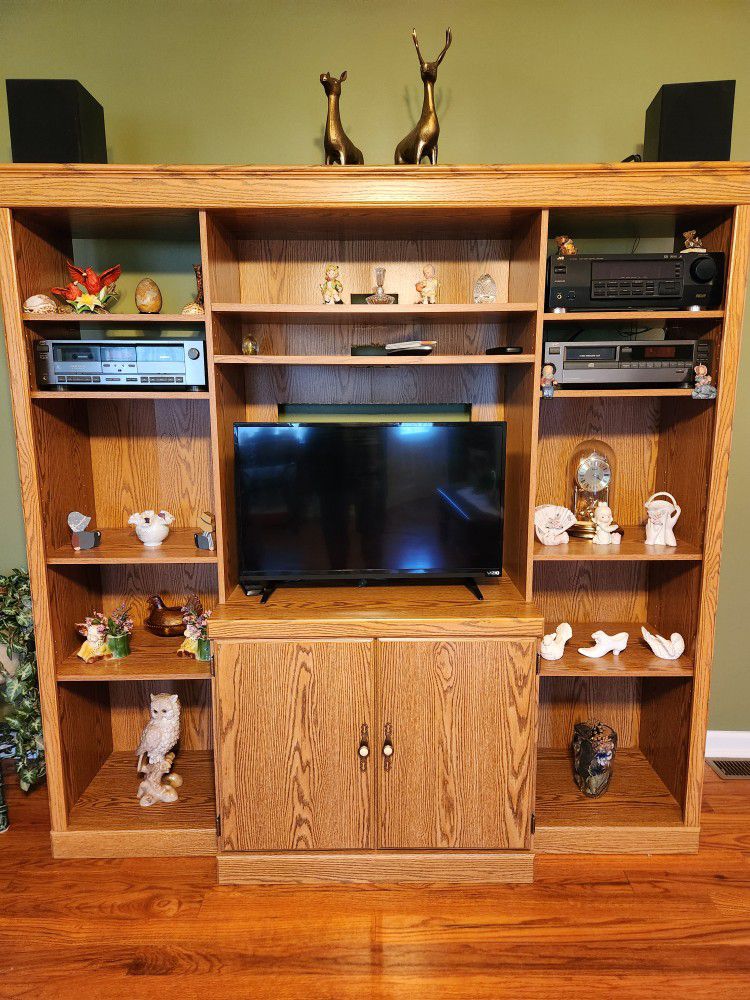 Sauder Entertainment Center. Large Piece. 72x21x72H. TV Opening is 32W x 25H - 30H. Contents NOT Included.
