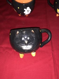 Set of four Halloween black cat mugs Can be used as gift cups