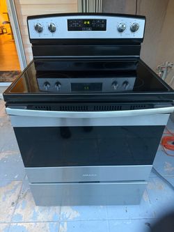 Amana 4 Burners Stove/Range 3 months warranty delivery and installation available