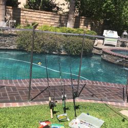  Three (3) Casting Fishing Rods With Reels plus Box Of Lures & Plastic Worms.