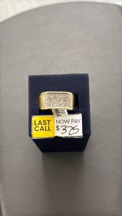 Man’s yellow ring with diamonds